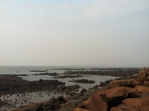 The beach at TIFR, looking north to the haze-obscured skyline of Mumbai